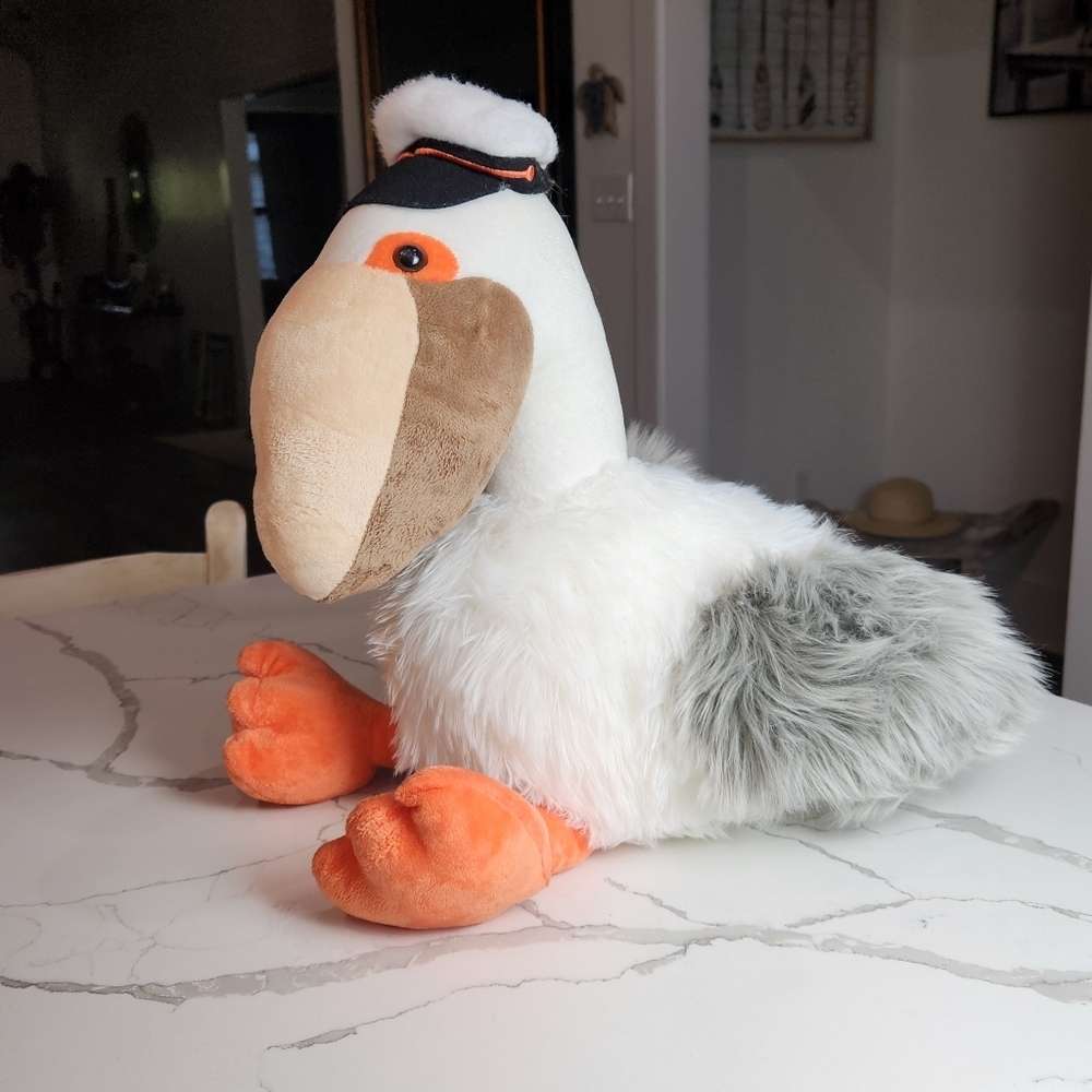 This & That Pelican Boat Captain Plush
